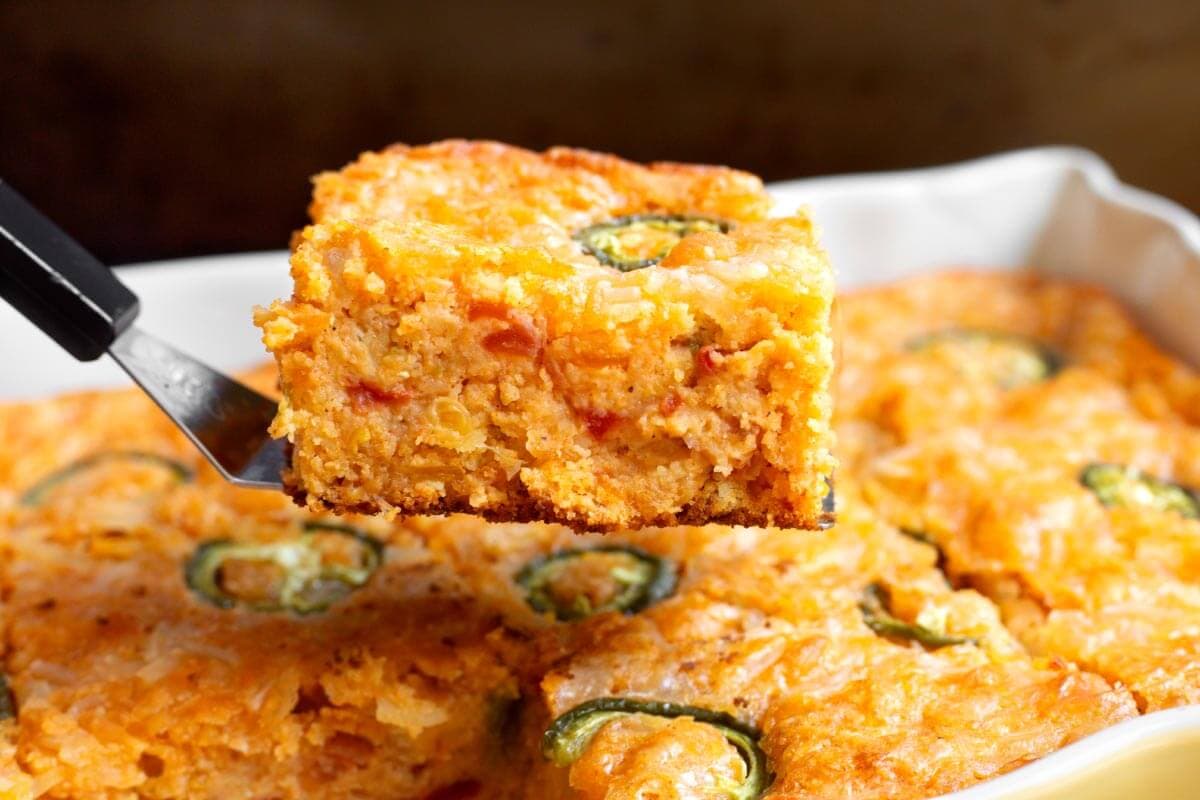 Slice of Tex-Mex Cornbread on a spatula from the side.