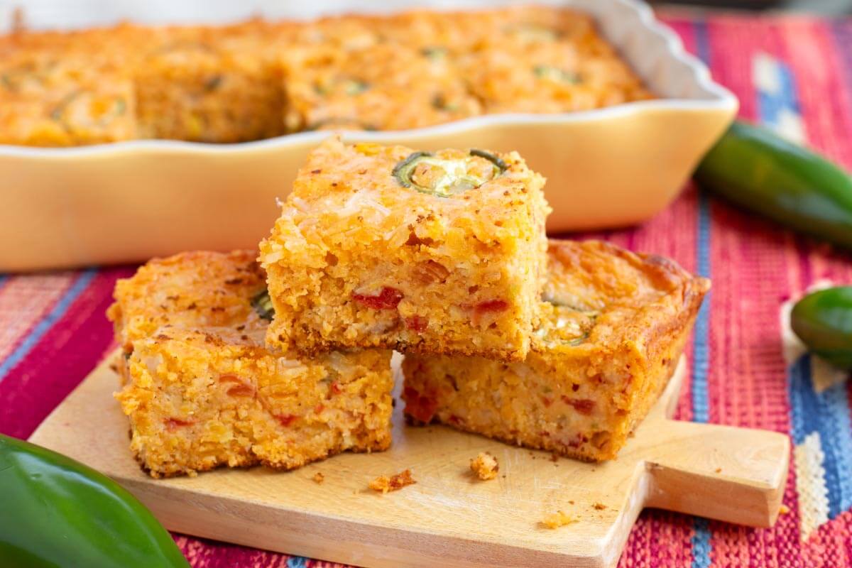3 pieces of Tex-Mex Cornbread on a board