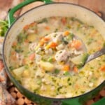 Chicken Pot Pie Soup in green pot with ladle