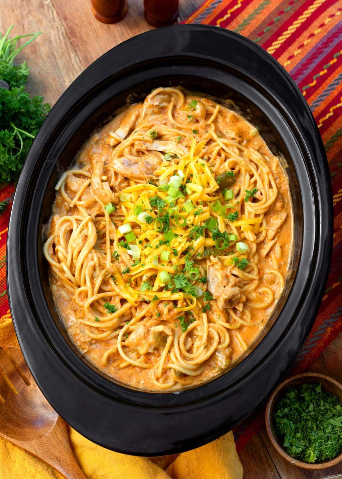 Taco Ranch Chicken Spaghetti in a black crock
