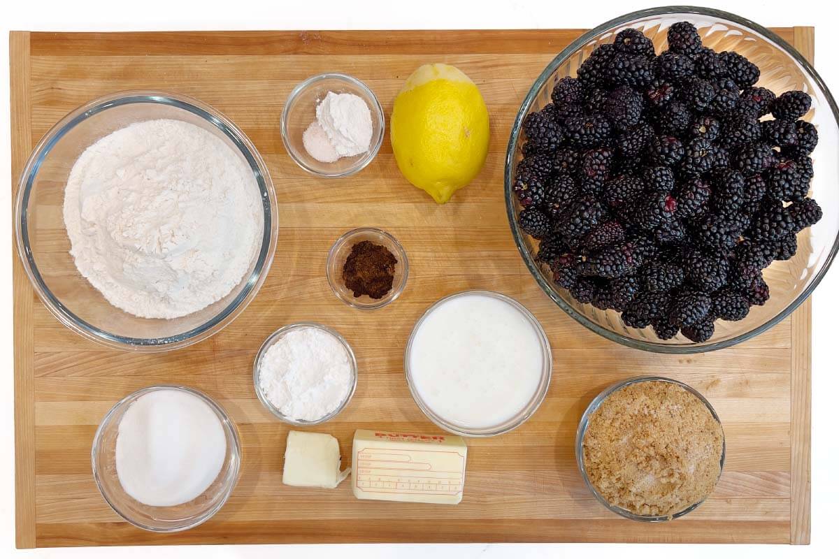 Homemade Blackberry Cobbler ingredients shot on board