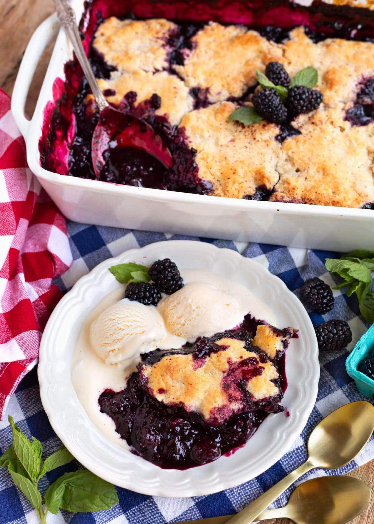 Homemade Blackberry Cobbler on a plate with ice cream