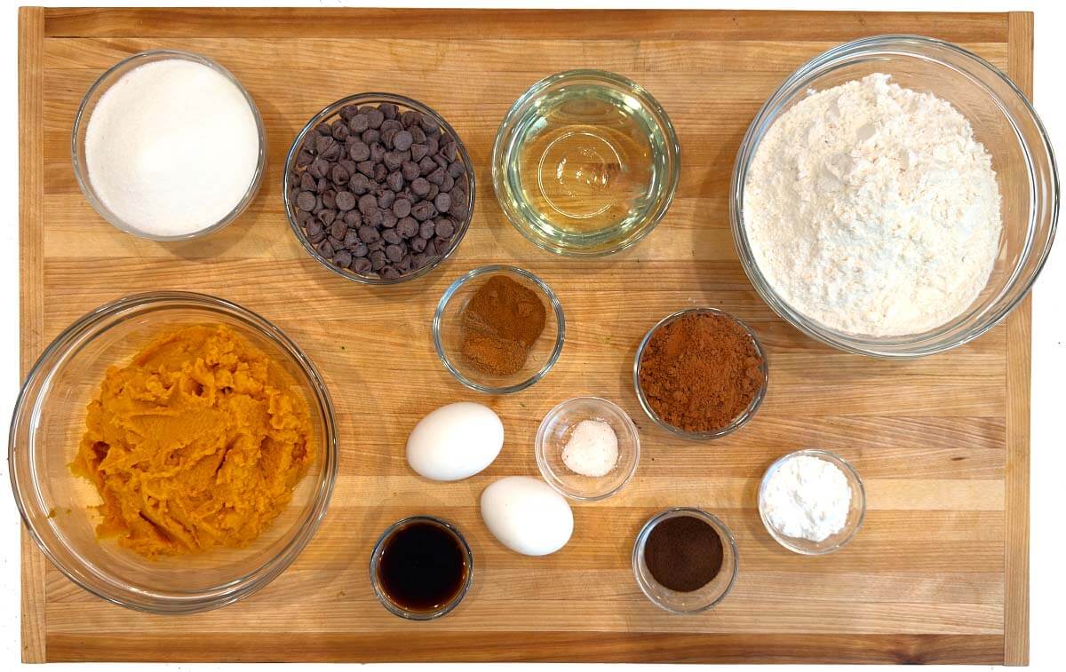 Chocolate Pumpkin Bread ingredients shot on a board