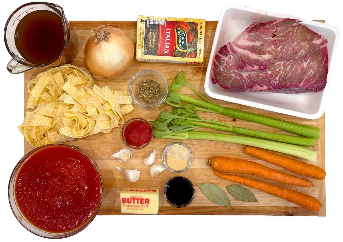 Crockpot Beef Ragu ingredients shot on a board