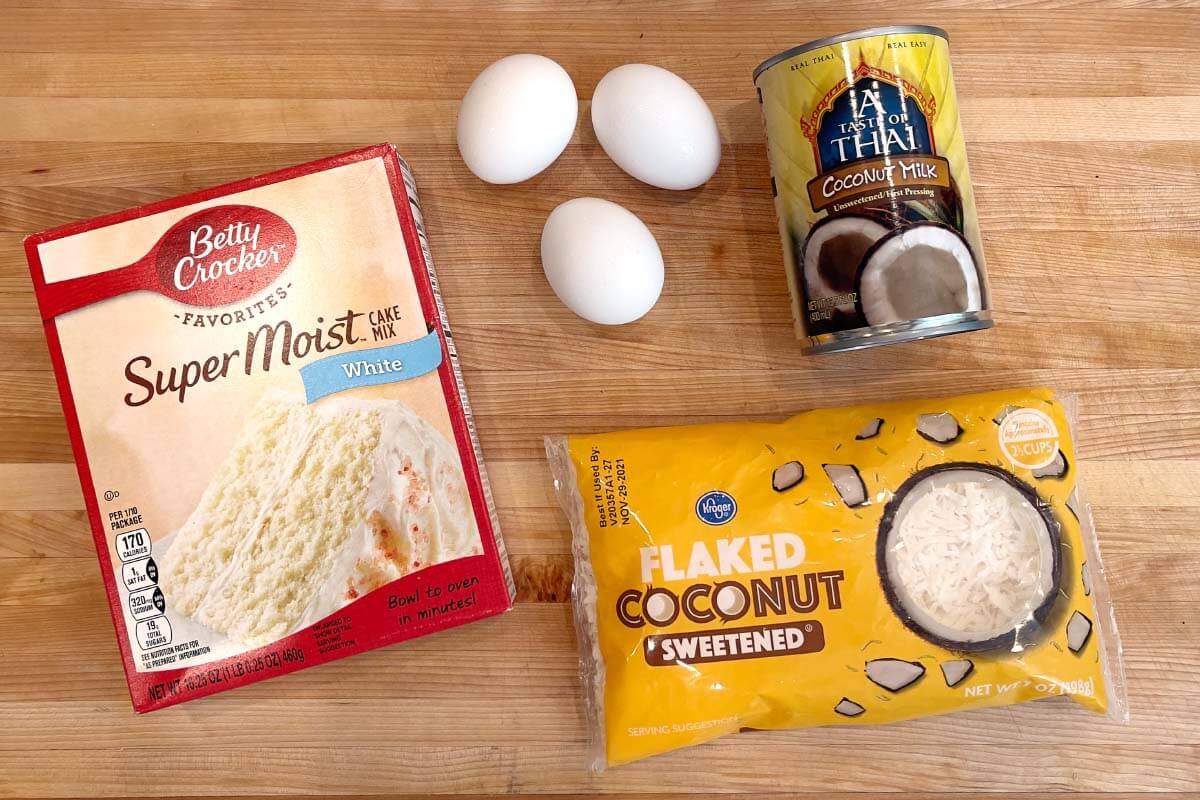 Easy Coconut Cake ingredients shot on a board