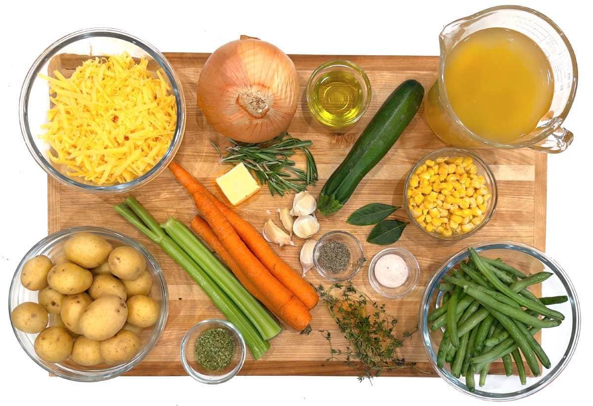 Homemade Creamy Vegetable Soup ingredients shot on a board