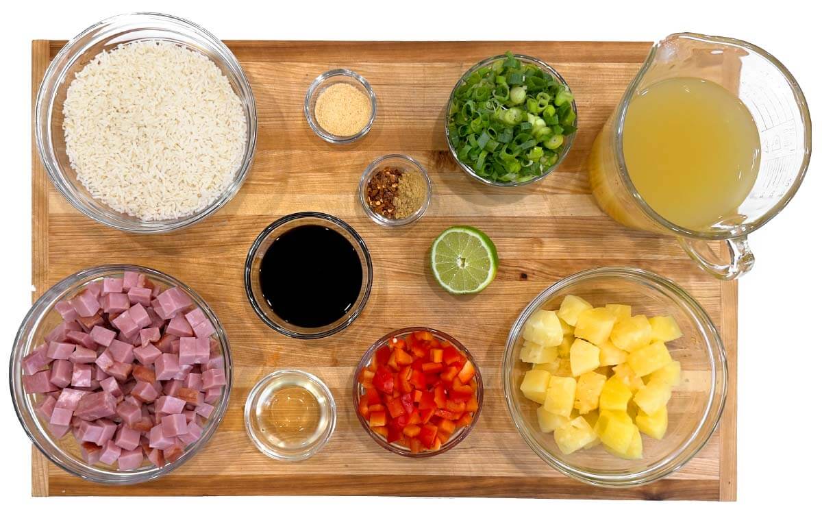 Ham and Pineapple Rice Casserole ingredients shot on a board