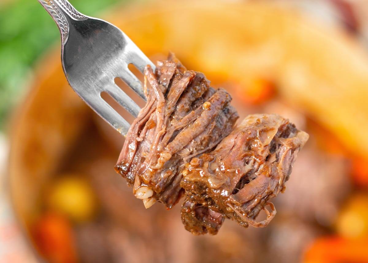smoky bbq beef on a fork closeup
